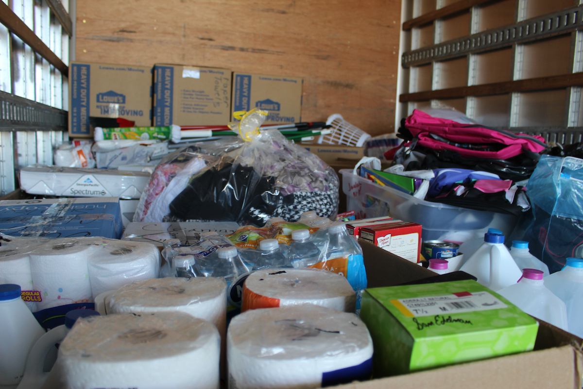 A truckload of supplies is loaded onto a truck for delivery to Crosby after the area was inundated by floodwaters. (Photo by Kentrice S. Rush/JSU)