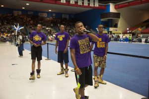 Like a number of other organizations, members of Omega Psi Phi Fraternity take the spotlight to show guests their school spirit. (Photo by Justin Hardiman/JSU)