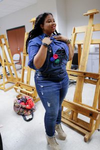 Fashion Designer Kamilah Grim, owner of Kamie's Kreations, became a fan of Kelly's. (Photo by Charles A. Smith/JSU)