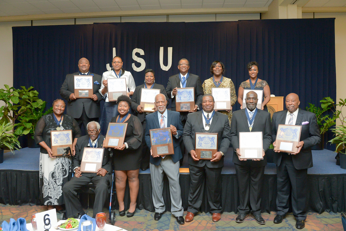 Members of the 2016 JSU Sports Hall of Fame class proudly display their plaques. (Photo by Darek Ashley/JSU.)