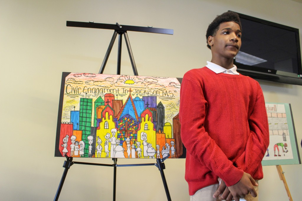 In keeping with the theme “Civic Engagement in Jackson,” Keyvon Williams, an eighth-grade first-place winner from Blackburn Laboratory Middle School, shares his vision. His poster depicts “One city; one people under God; we the people; equal rights; freedom; no violence; skin deep non-racial.”