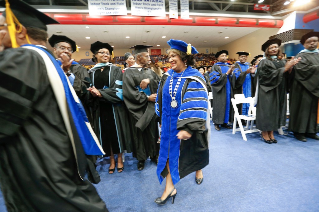 President Carolyn W. Meyers graces the arena as she ambles toward the stage for the start of JSU’s annual Founders’ Day celebration. (Photo by Charles A. Smith/JSU)