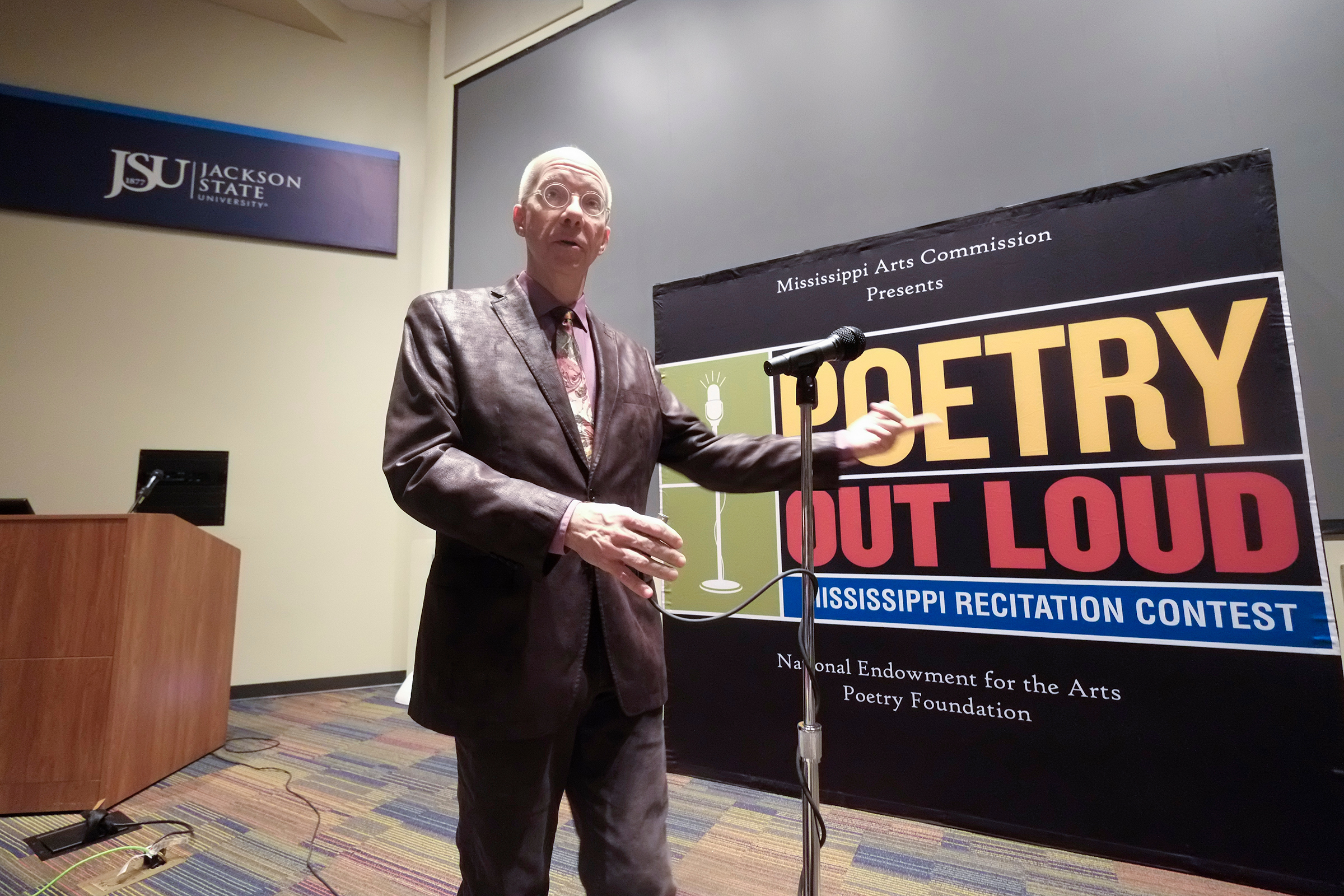 Ken Bolisnky, coordinator of Poetry Out Loud, prepares to announce the winners on Wednesday in JSU's Student Center. (Charles A. Smith/JSU)