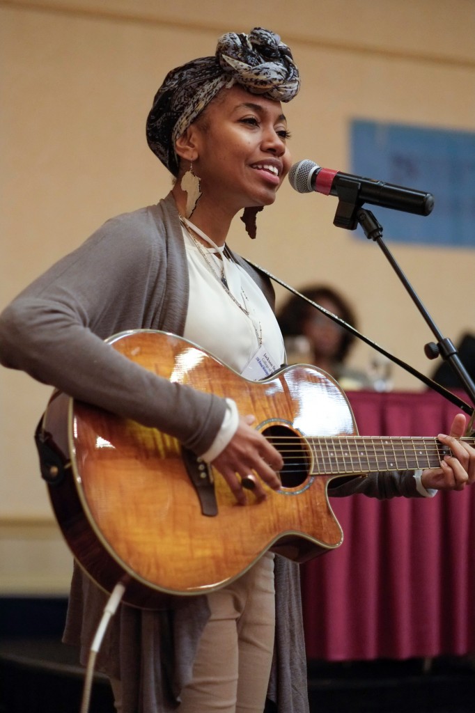 Jalise Haney, a master of social work student, delivers a soul-stirring performance during the conference.