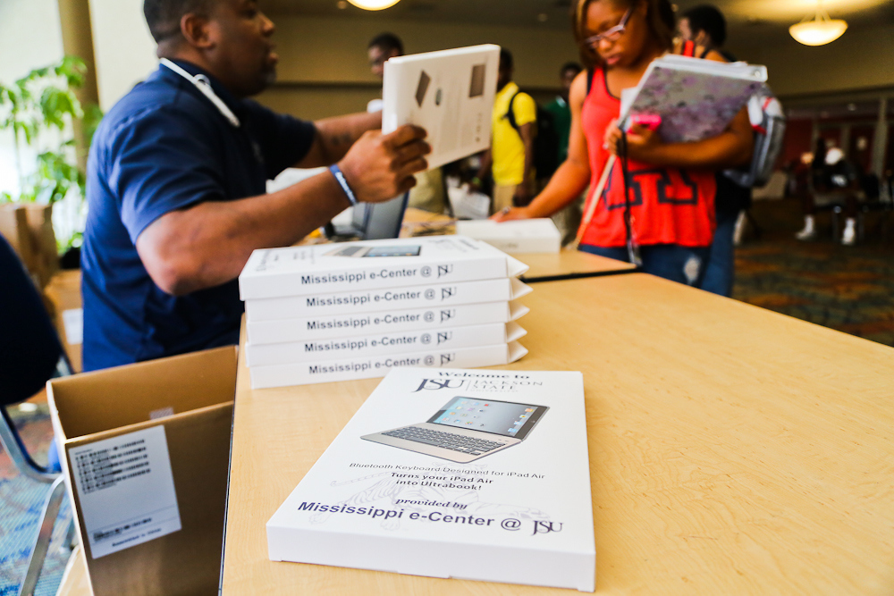 More than 5,000 iPads have been distributed since the giveaway initiative began. In addition to the devices, the kits include a Bluetooth keyboard, a case and productivity apps. (Photo by Charles A. Smith.)