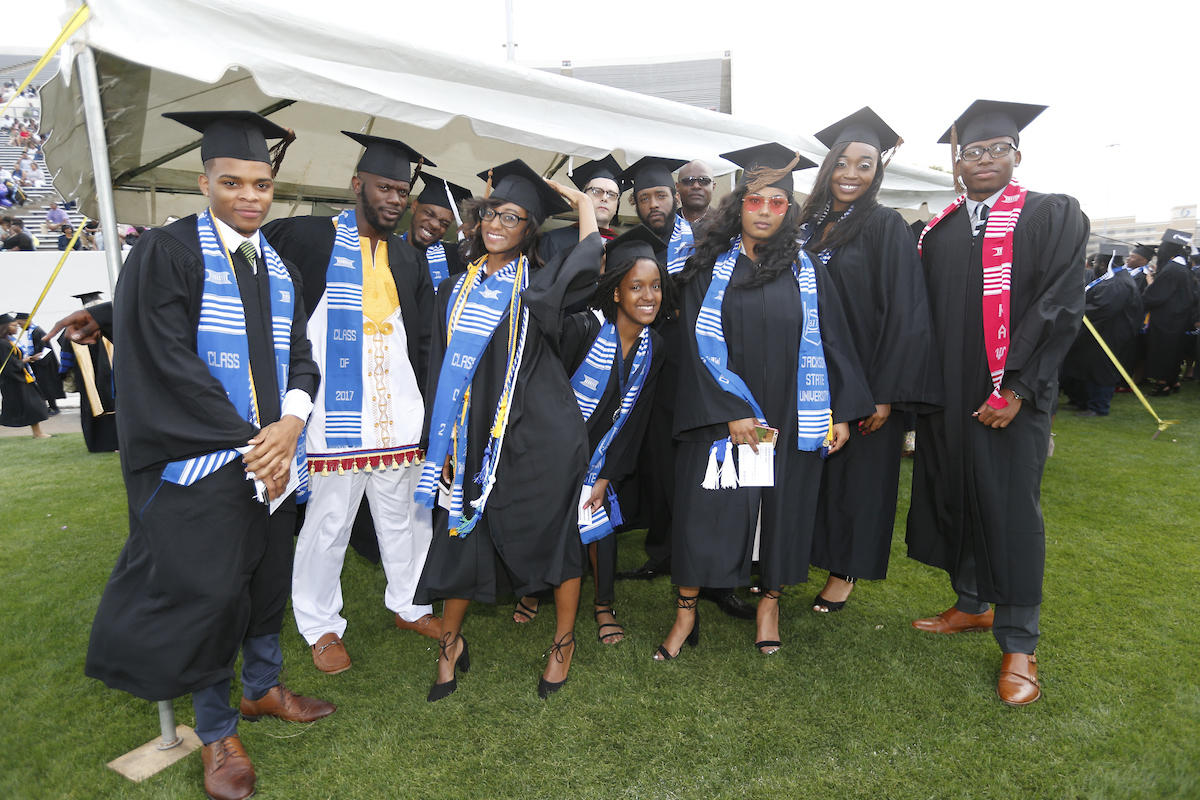 Graduates prepare for the 2017 undergraduate commencement ceremony, with nearly 700 receiving bachelor’s degrees in various disciplines. (Photo by Charles A. Smith/JSU)