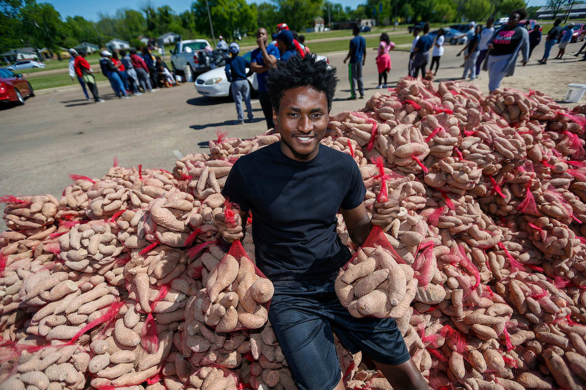 Although Jackson State University freshman Marqus Brooks earned community-service hours for his participation in the annual Crop Drop, he said he was especially pleased to be part of a worthwhile cause. The event, in collaboration with the Society of St. Andrew, was sponsored by the Center for University-based Development and the Alice Varnado Harden Center for Service and Engaged Learning (Photo by Charles A. Smith/JSU)