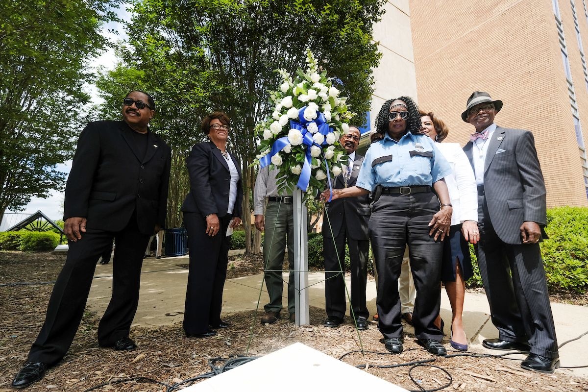 A number of people affected by the tragedy returned to pay homage to those who lost their lives or were injured. A wreath was placed outside Alexander Residence Hall, a building struck by a barrage of gunfire. (Photo by Charles A. Smith/JSU)