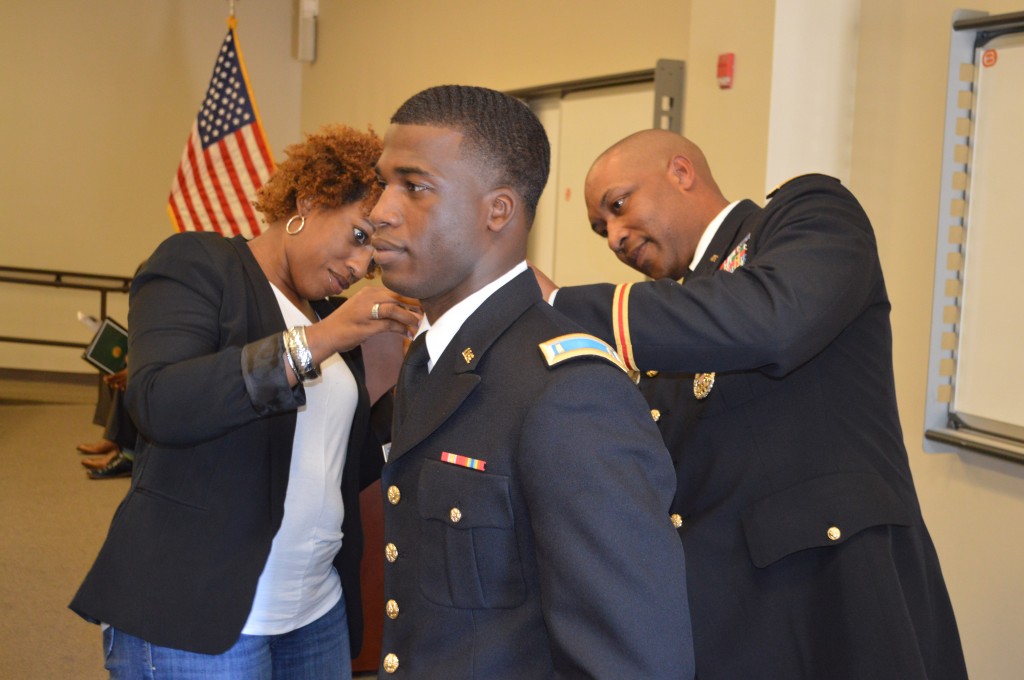 Mississippi Valley State University’s Thaddeus McClinton is commissioned to second lieutenant, with help from a family member and Lt. Col. Dexter “Dex” M. Brookins, department chair and professor of Military Science and Leadership of the JSU Army ROTC. MVSU is part of the Tiger Battalion.