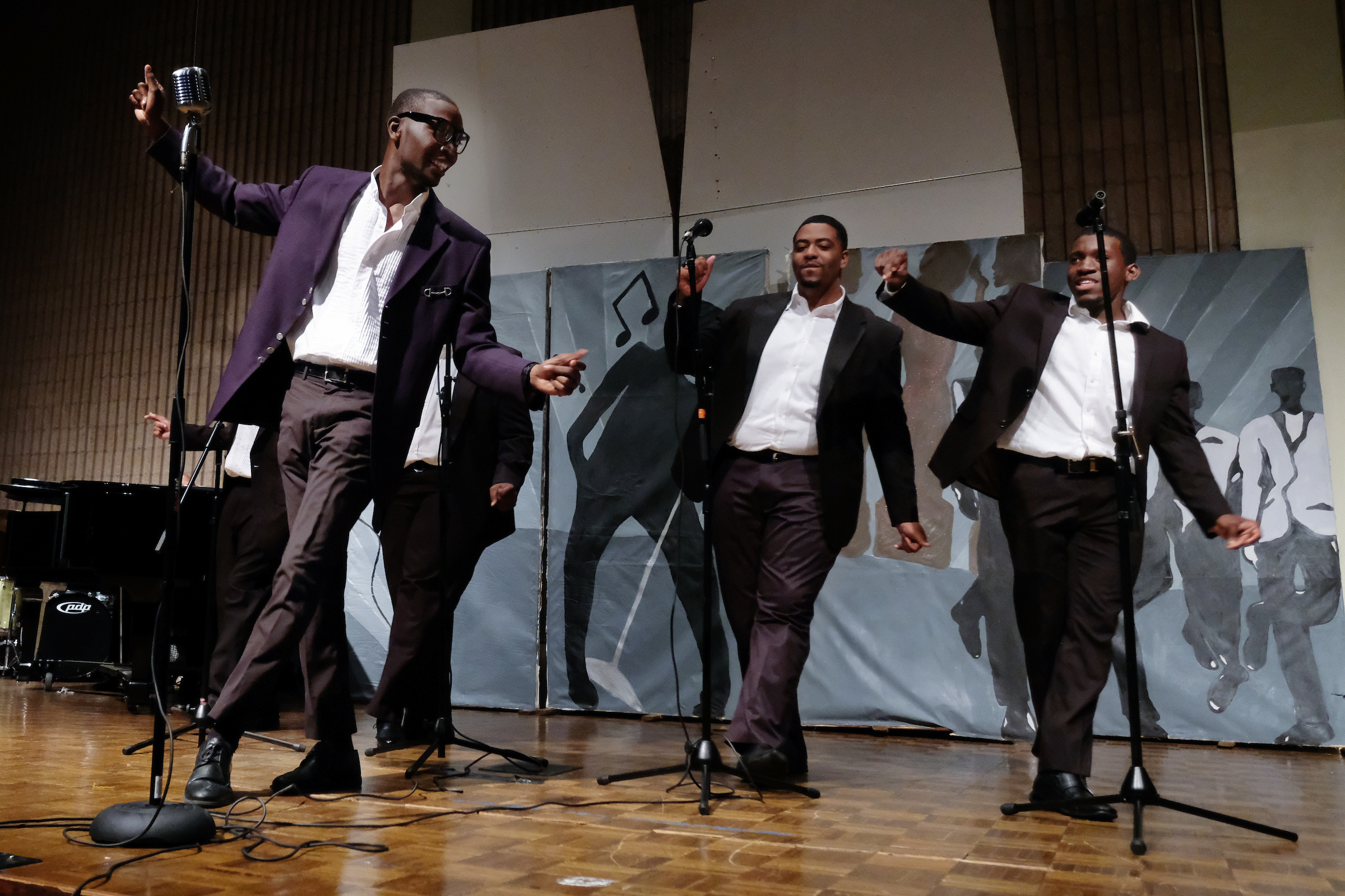 The Temptations (Scott, Hughes, Middleton, Brown and Hope) show their leg work in "Ain't Too Proud to Beg." (Charles A. Smith/JSU)