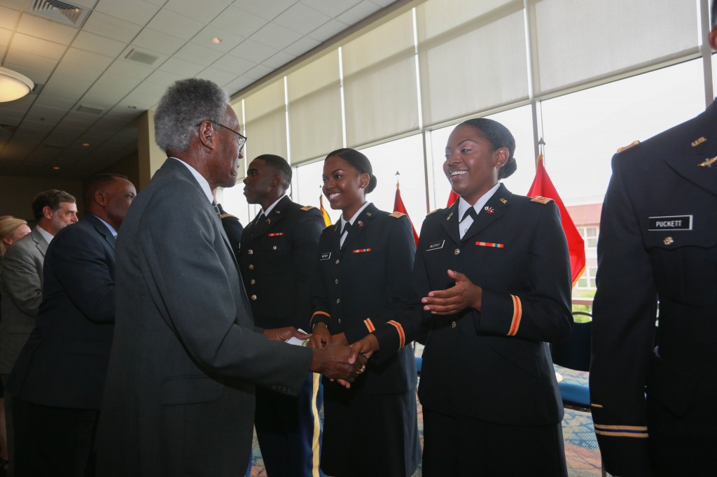 JSU president emeritus Dr. James A. Peoples Jr. congratulates identical twins Diamond and Sapphire McCray, both of Magnolia, Miss. On Saturday, 2nd Lt. Diamond McCray earned her bachelor of science degree in political science in JSU’s College of Liberal Art. Second Lt. Sapphire McCray earned her bachelor of science degree in biology/pre-medicine in JSU’s College of Science, Engineering and Technology. Peoples, as the sixth president of JSU, founded the Army ROTC at JSU 50 years ago. (Photo by Kentrice S. Rush/JSU)
