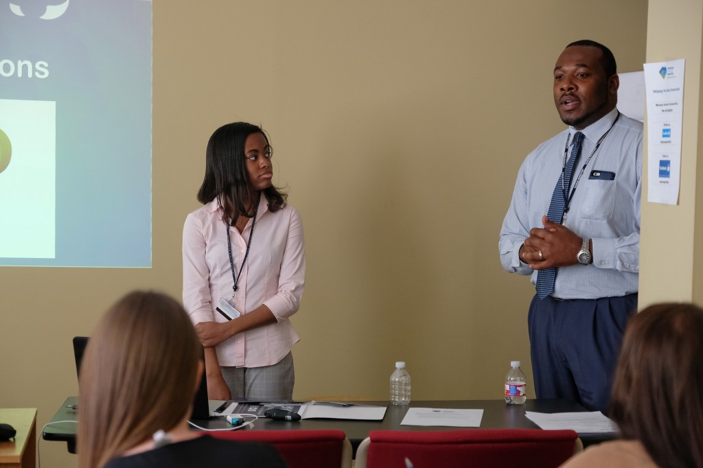 Spencer McClentry, director of JSU social media, and Kentrice Rush, social media associate, discussed hashtags, best strategies and other tools and tips with nonprofit organizations for domestic violence, adoption and faith-based communities on May 9. (Photo by Charles A. Smith/JSU)