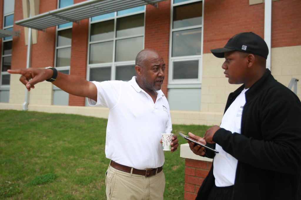 Ephraim Hill, an eighth-grade student from Blackburn Middle School, plans a flight path for a drone competition with instruction from Dr. Kamal S. Ali, chair of JSU's Department of Industrial Systems and Technology. (Photo by Kentrice S. Rush/JSU)