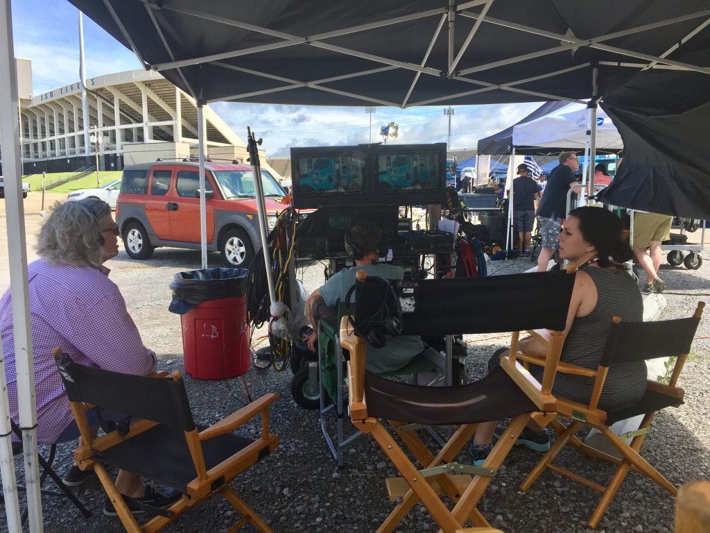 Monitors capture the scene as production crews film the commercial. (Photo by Kentrice Rush/JSU)