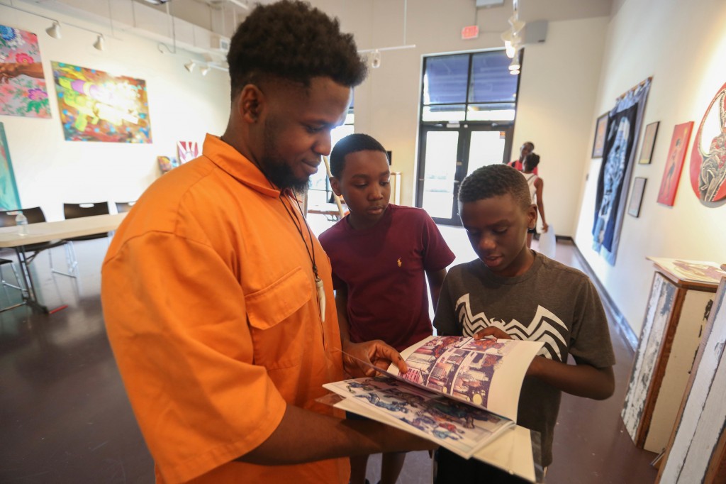 Fifth-grader Willis Gill, center, a student at Highland Elementary, said, “My mom introduced me to this camp, and the more I came here, the more I liked it. I get to express myself in different ways with art. I also learned about different artists and how they work with their paint brushes, pencils, and everything. (Photo by Kentrice S. Rush/JSU)