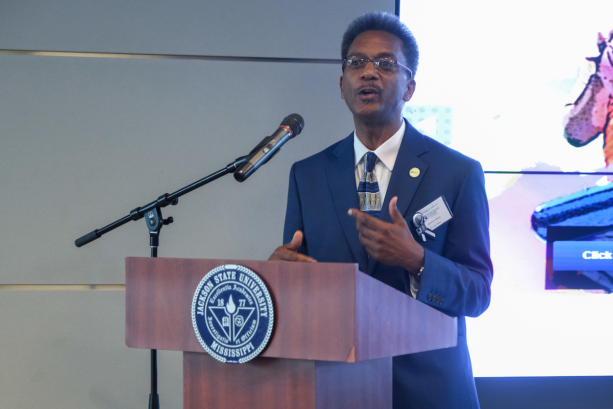 Dr. Sam Mozee, associate director of the Mississippi Urban Research Center at Jackson State University, touts the importance of showcasing the people, programs, partnerships and projects inside the JSU Downtown Campus, 101 Capitol Street. Dozens of JSU constituents and stakeholders joined JSU administrators, faculty and staff Wednesday to celebrate the facility’s excellence. (Photo by Charles A. Smith/JSU)