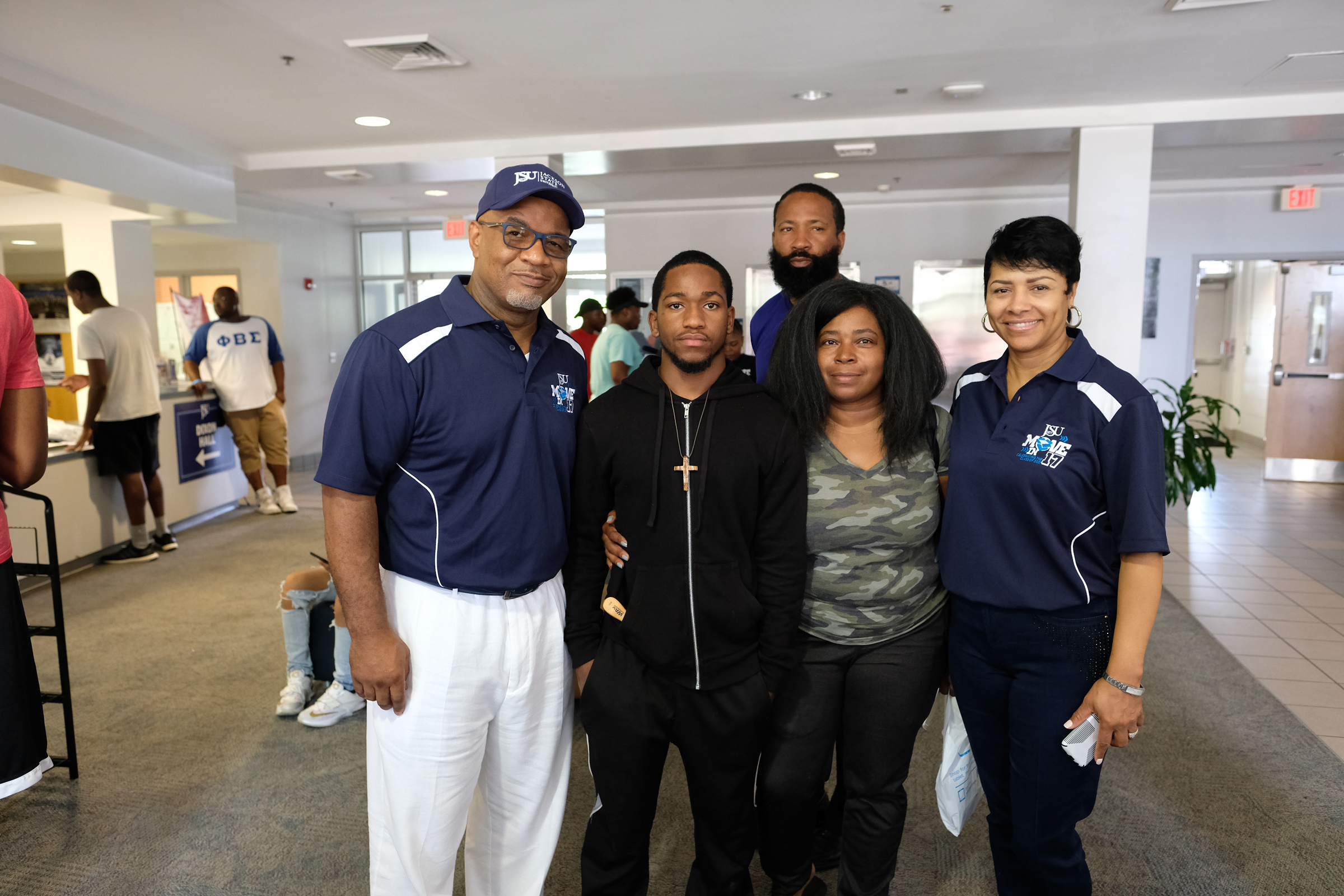 President Bynum, left, Parker DeLoach, Charles DeLoach, Tamara DeLoach, and first lady Deboray Bynum. Tamara says the president and his wife eased her fears about leaving her youngest son at the University. (Photo by Charles A. Smith/JSU)