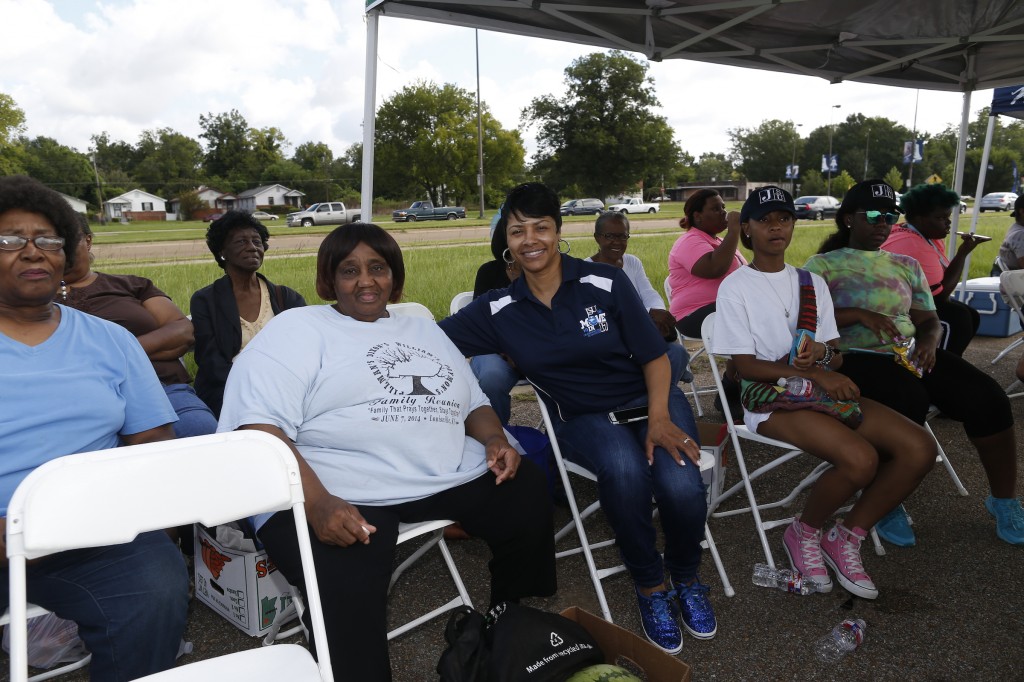 First lady Deborah Bynum chats with local community members and students at the university's annual crop drop. (Photo by Charles A. Smith/JSU)