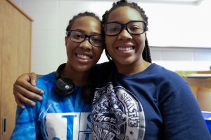 J'lani DeLoach, left, says she has mixed emotions about her big sister Kamryn going away to college. (Photo by Charles A. Smith/JSU)