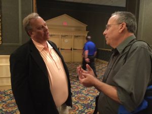 Keynote speaker John Pierce Wise Sr. discusses his research on chromium with an attendee. Wise represents the Wise Laboratory of Environmental and Genetic Toxicology as well as the Department of Pharmacology and Toxicology at the University of Louisville.