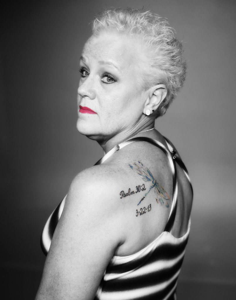 This image of Yana Knight hangs in the museum. It displays her dragonfly tattoo as a symbol for embracing change and seeing it as “positive and freeing.” (Photo by Spencer L. McClenty)
