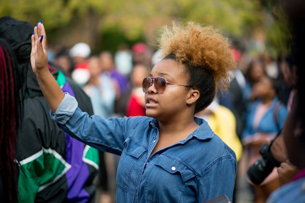 One student lifts her hand in praise as students sing a mixture of gospel hits by Grammy award-winning artist Kirk Franklin during his surprise visit to the JSU campus, Thursday, Nov. 16, 2017.