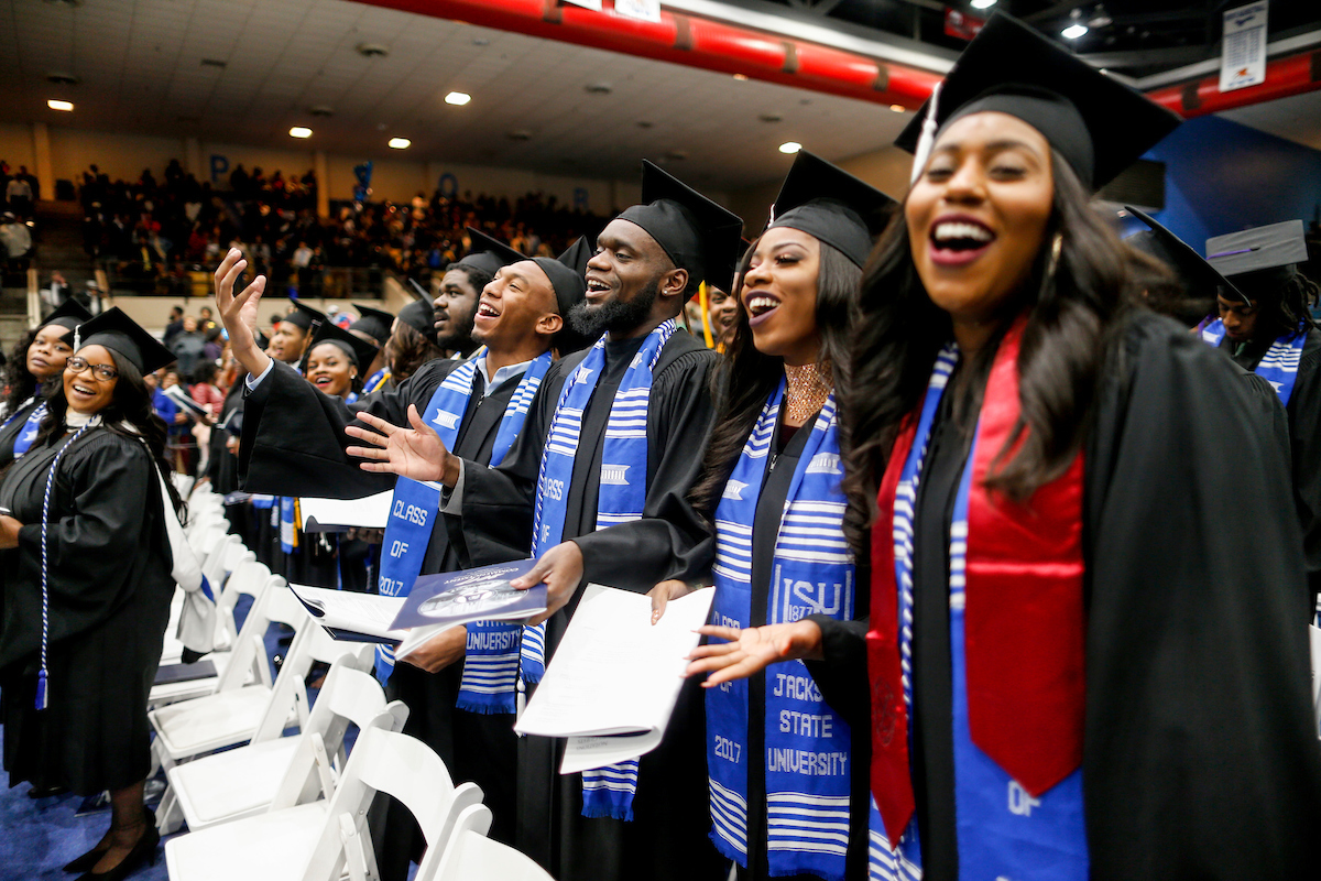 Ecstatic graduates demonstrate their affection for “Thee I Love.” (Photo by Charles A. Smith/JSU)