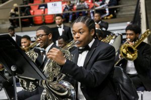The University Symphonic Band gets the processional underway with “Pomp and Circumstance.”(Photo by Charles A. Smith/JSU)