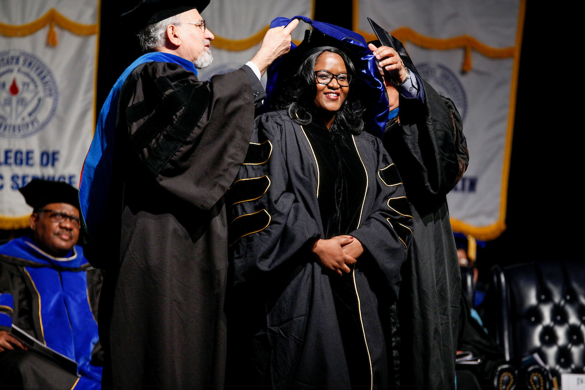 Now a doctor, a graduate in the School of Public Health earns her ultimate academic achievement. (Photo by Charles A. Smith/JSU)