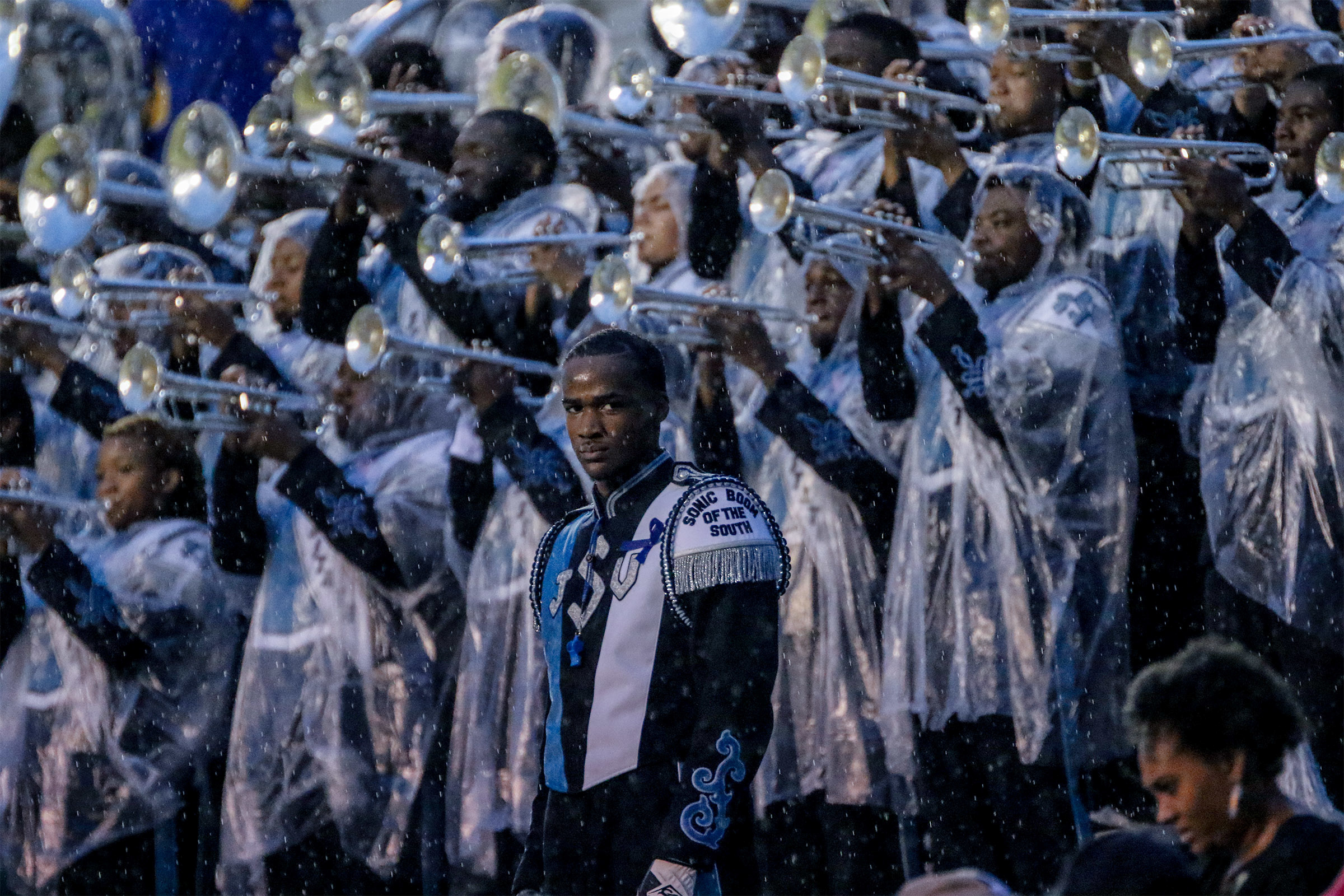 Social media associate Kentrice Rush captured lead drum major Abraham Duffie as he and members of the Sonic Boom of the South stand resolute in the rain.