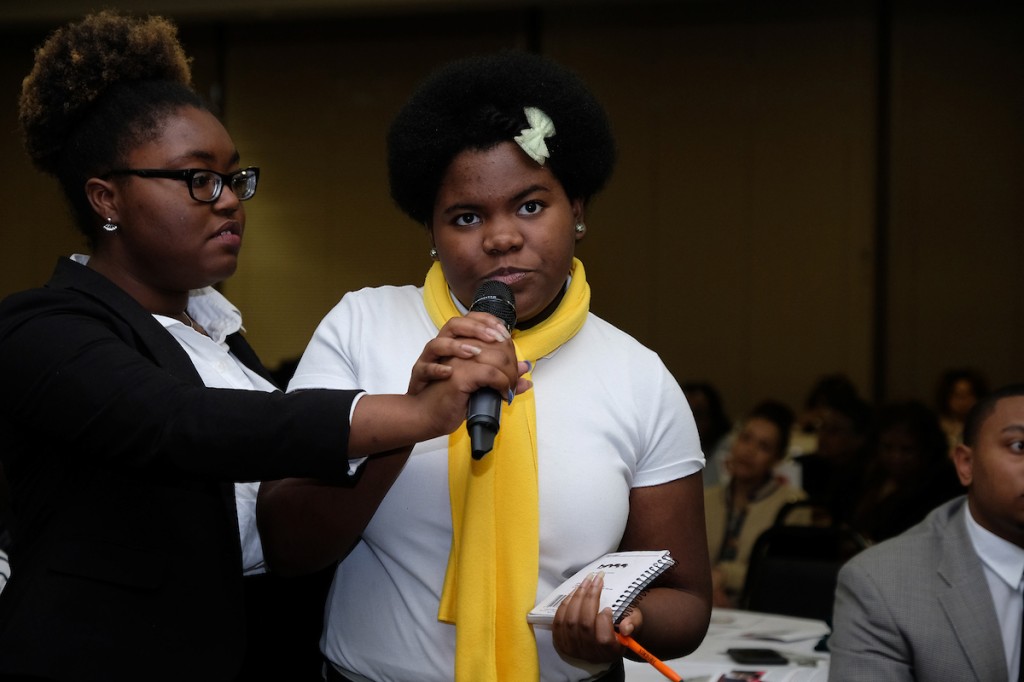 A young audience member engages the panel in a Q&A about the future of HBCUs. (Photo by Charles A. Smith/JSU)
