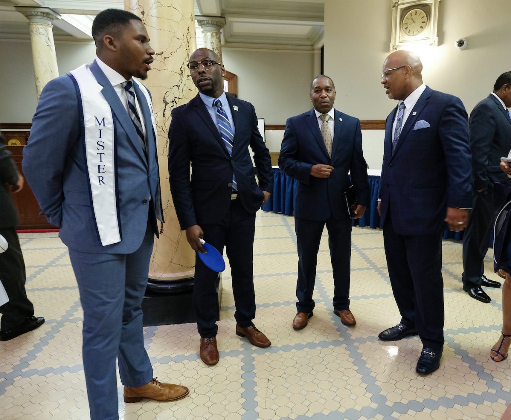 Mister JSU hobnobs with JSUNAA board member Jerry Zigler as Bynum continues greeting supporters of JSU. (Photo by Charles A. Smith/JSU)
