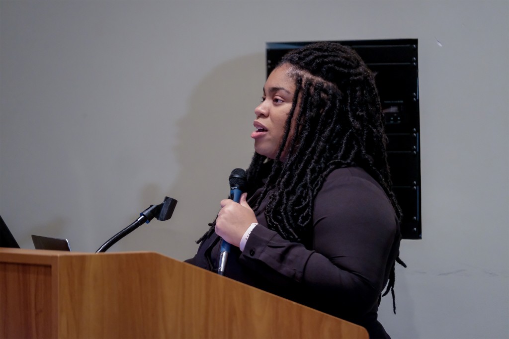 Author Angie Thomas tells an audience at JSU how rapper Tupac Shakur, her childhood and social injustice led to her writing the New York Times bestseller "The Hate U Give." (Photo by Charles A. Smith/JSU)