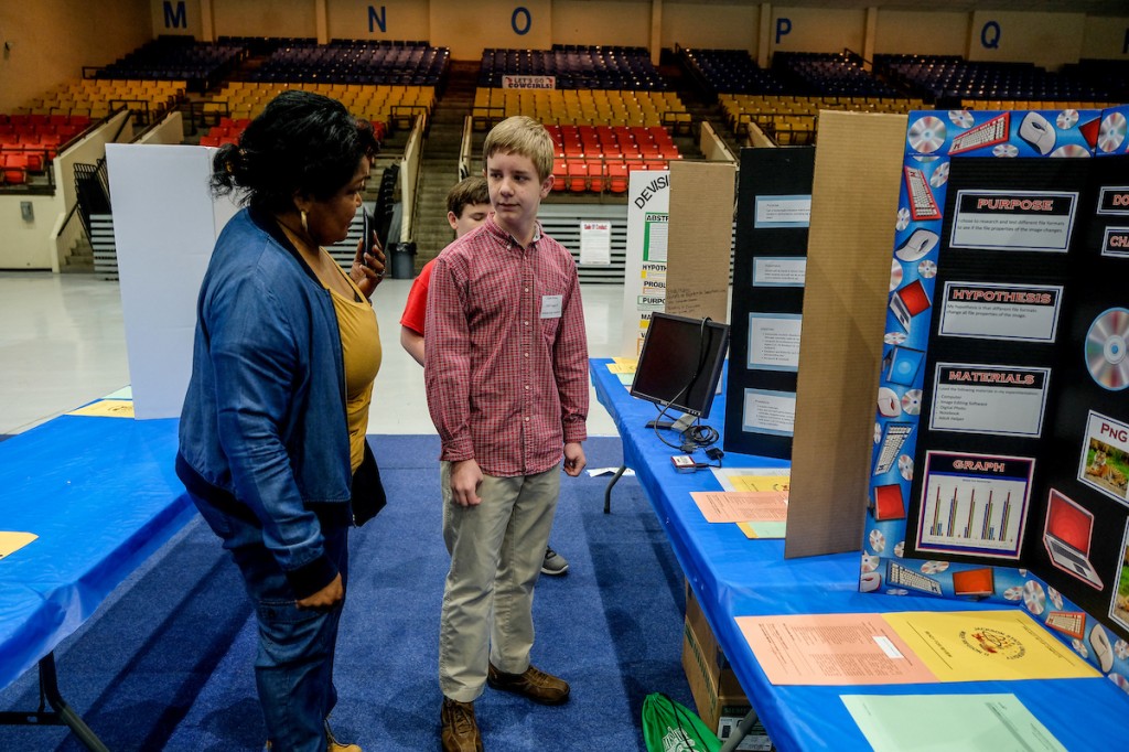 The education venue provides an opportunity for students to talk to judges about the purpose of their concepts and prototypes and get feedback on furthering the project. Students also answer questions about techniques, processes and explain how their ideas will benefit society. (Photo by Charles A. Smith/JSU)