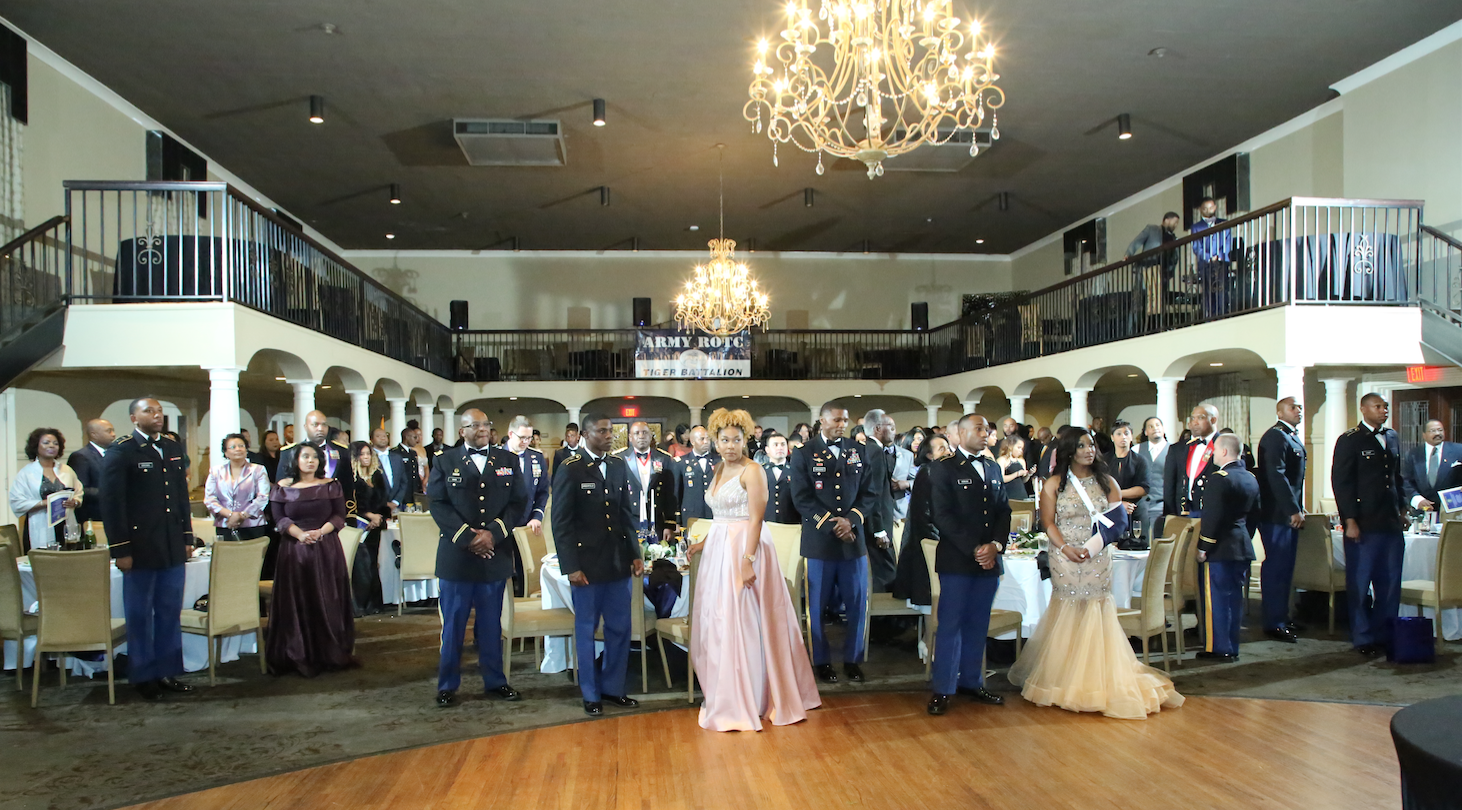 The audience stands at attention during the posting of colors, national anthem and invocation for JSU Army ROTC’s 49th Annual Spring Gala. The event was help in the Old Capitol Inn in downtown Jackson.