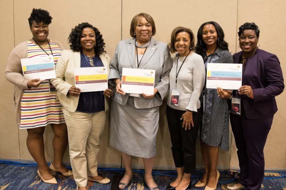 Faculty and staff of Undergraduate Studies showcase their awards during the Frontier Set gathering in Atlanta. The JSU team was recognized for “Being the Most Enthusiastic about Integrating New Learnings,” voted as the site to “Deliver the Most Impactful Solutions” and placed first in “Making the Most Meaningful Connections.”