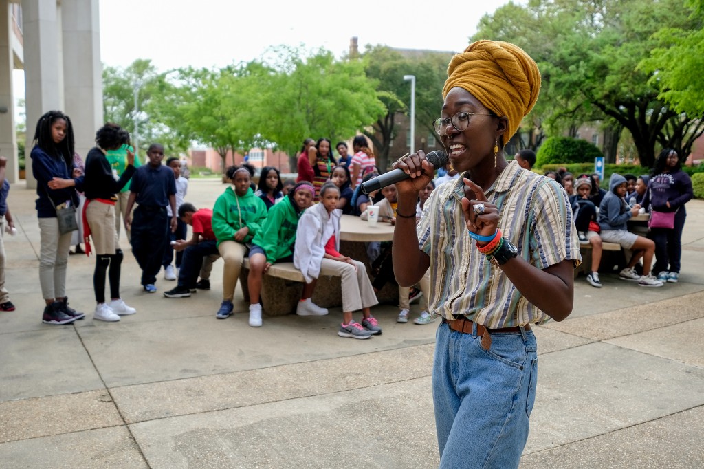 Charity Hicks, who uses the rap pseudoynm Vitamin Cea, shares some of her catchy rhymes with the Blackburn students. (Photo by Charles A. Smith/JSU)