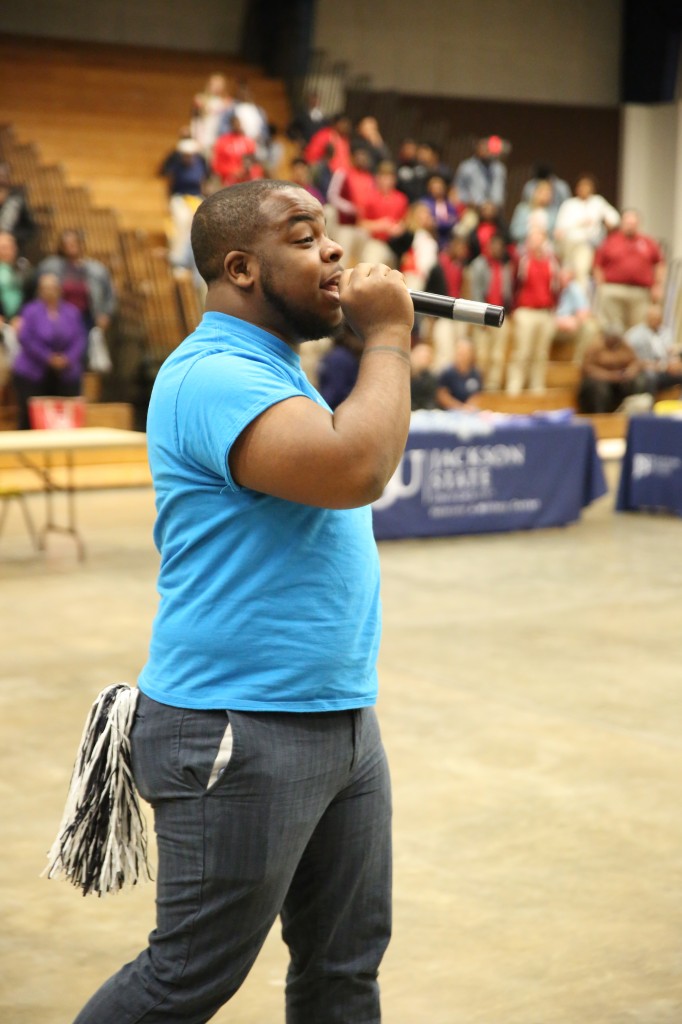 Jauan Knight, a JSU graduating senior political science major and a leader of Blue Ambassadors, energizes the crowd in Greenville. “I absolutely love the initiative that Dr. Bynum is taking in recruitment,” Knight said. “The students have never seen a JSU president do a recruitment tour in the way that we have been doing. The experiences were great; the events were great. The high school students loved it. I thought it was amazing. I look forward to seeing what they do when they end up coming to JSU.” (Photo by Spencer L. McClenty/JSU)
