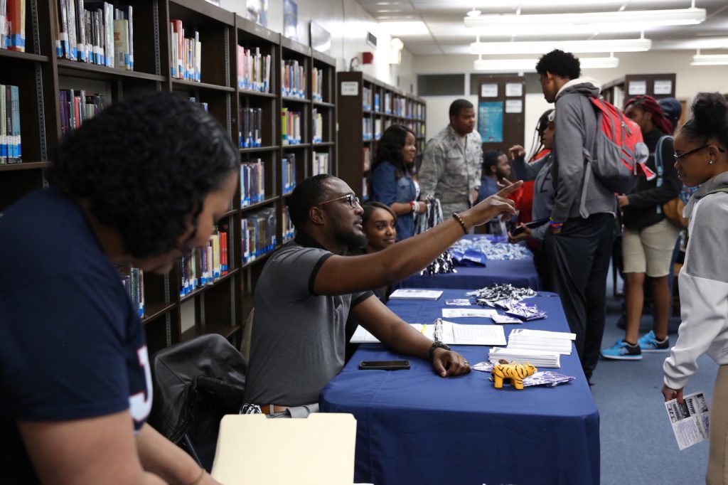JSU’s Arron L. Richardson, interim director of JSU’s Disability Services, provide information to inquisitive students. (Photo by Spencer L. McClenty/JSU)
