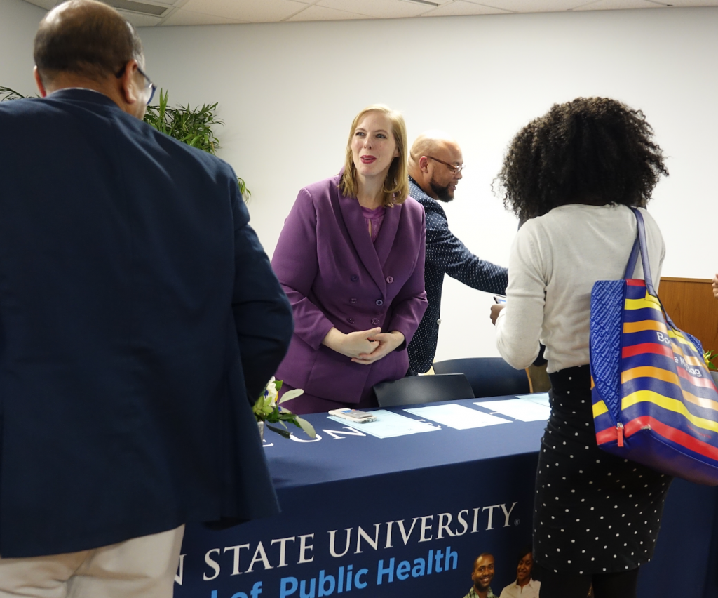 JSU alum Dr. Amy Radican-Wald, a senior policy analyst for the Center for Mississippi Health Policy, engages with attendees after a forum. Earlier, Radican-Wald shared a number of ways to motivate and educate people about the significant roles of those working in the public health profession.