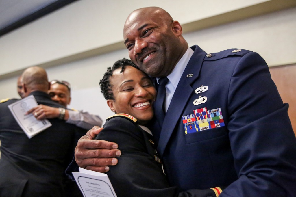 Newly promoted U.S. Army Lt. Col. Natalie Bynum is congratulated by U.S. Air Force Lt. Col. Chris Wright. Bynum is a 2001 graduate who was commissioned by JSU ROTC. While at JSU, she was a J-Sette and a member of the Delta Pi chapter of Delta Sigma Theta, Inc. This summer, she will become the chair and professor of military science at North Carolina AT&T. (Photo by Aron Smith/JSU)