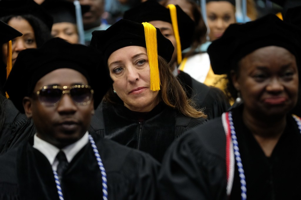 Graduates listen intently to the commencement speech delivered by Moore. (Photo by Charles A. Smith/JSU)