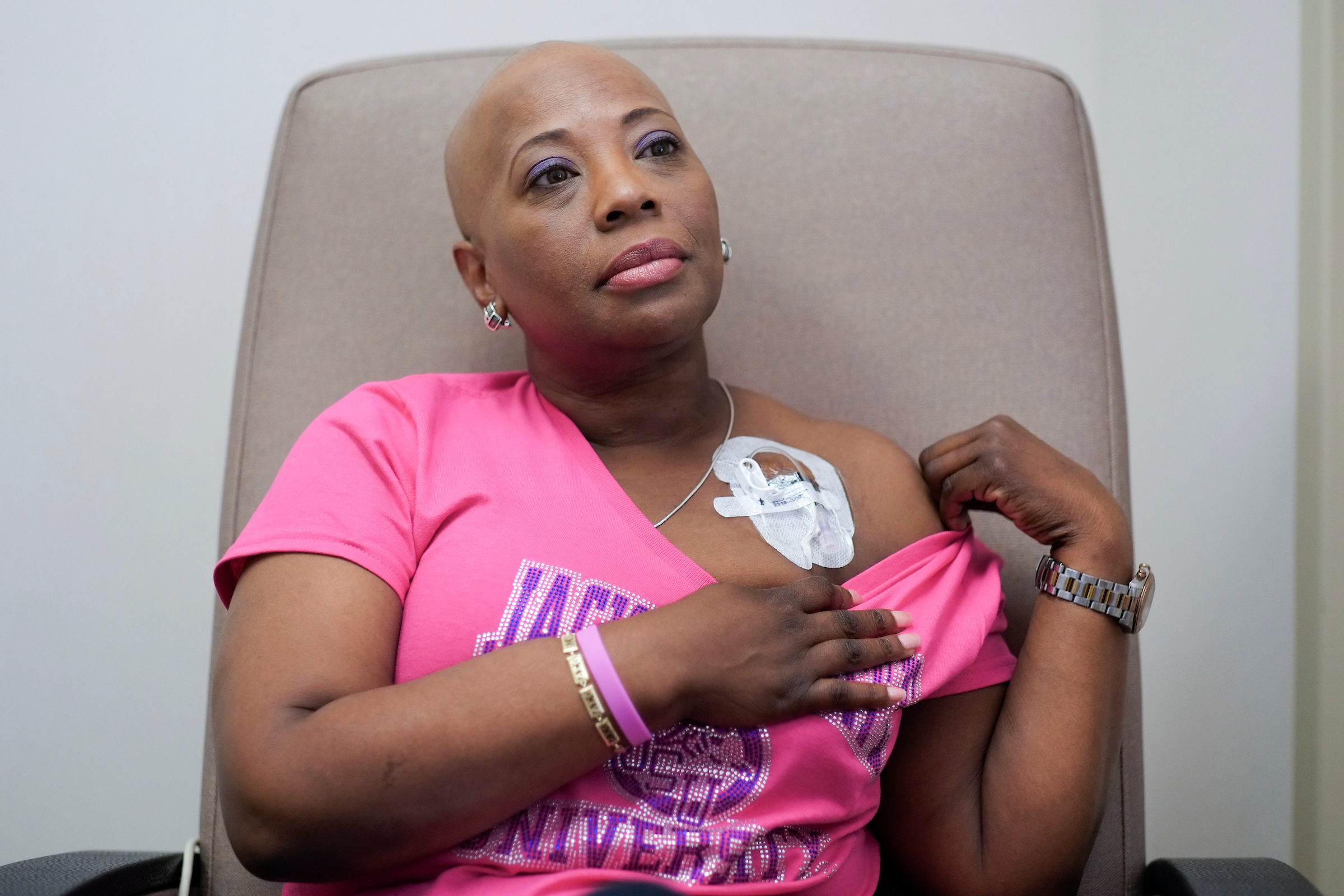 Earlier in her treatment phase, WJSU general manager Gina Carter-Simmers showed the central line used to administer chemotherapy. The breast cancer advocate is sponsoring her second awareness event at 6 p.m. Thursday in the Amour, 1100 John R. Lynch Street, across the street from the Jackson State University Student Center. Survivors will be pampered, and all women are asked to wear their fun wigs, whether channeling Diana Ross, Chaka Khan or any other famous person. (Photo by Charles A. Smith/JSU)