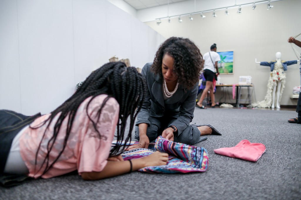 Shonda McCarthy, director of JSU art galleries, has a hands on approach while helping students in her JSU summer sewing camp. (Photo by Charles A. Smith/JSU)