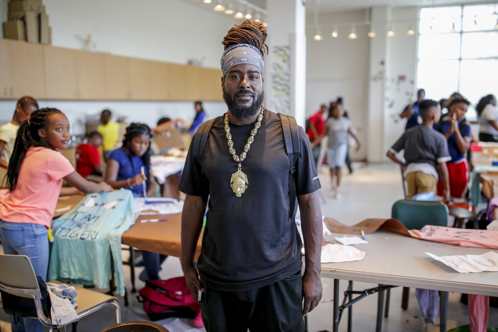 Artist Shambé Jones is an '02 graduate of JSU and specializes in ceramics, scuplture, painting and woodburning. Jones says that he wants students to view art as a viable career option. (Photo by Charles A. Smith/JSU)