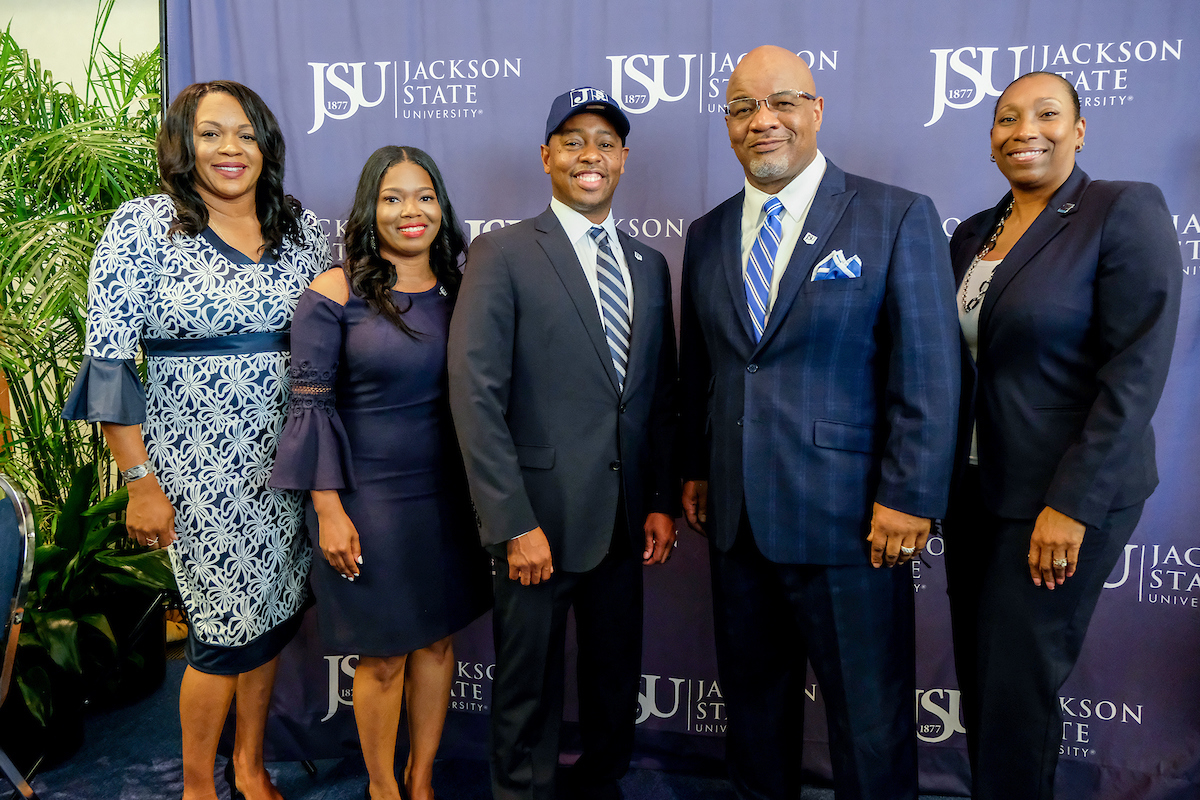 Robinson is joined by Genese Lavalais, left, JSU’s associate director of athletics for academics; his wife, Danielle; JSU President William B. Bynum Jr., and Dr. Debra Mays-Jackson, JSU’s vice president and chief of staff. (Photo by Charles A. Smith/JSU)
