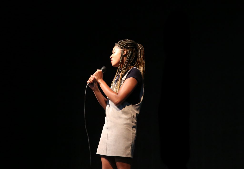 Jonet Washington, a senior at JSU and member of OutSpoken, sang an acapella and goose-bump inducing version of Mariah Carey's song "Hero." (Photo by Kentrice S. Rush/JSU)