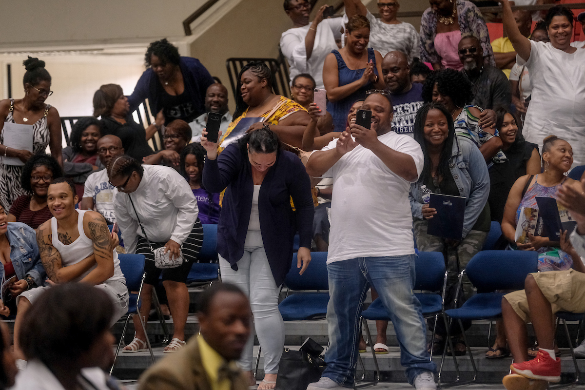 Family members are excited to get a taste of what the 2022 graduation will bring. (Photo by Charles A. Smith/JSU)