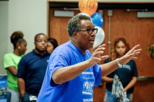 Dallas Mayor Pro Tem Dwaine Caraway talks to his group of 200 students before JSU recruiters deliver their presentation. (Photo by Charles A. Smith/JSU)