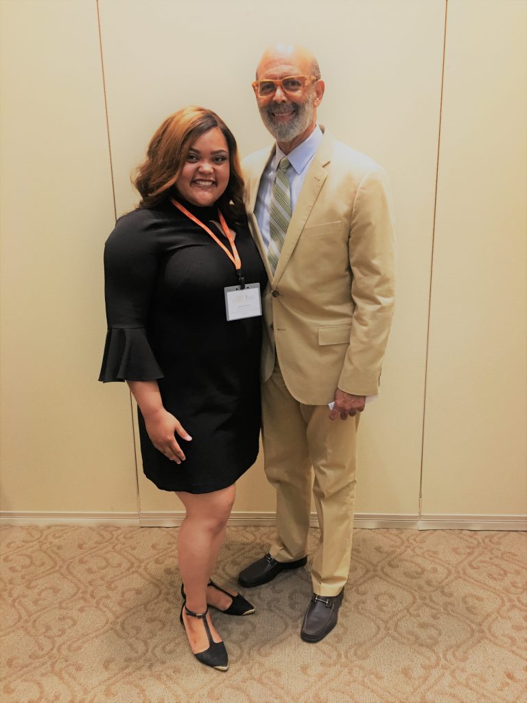 Jasmine Gibson, senior education major at JSU, snaps it up with Michael Lomax, CEO of the United Negro College Fund. (Photo special to JSU)
